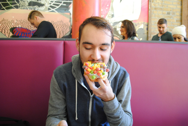 Marc with a fancy cereal donut ignoring me